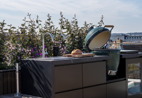 Complete outdoor kitchen in an exclusive landscape garden